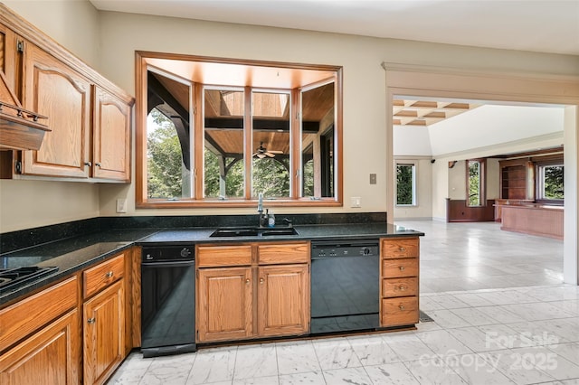 kitchen with sink, dark stone countertops, ceiling fan, and dishwasher