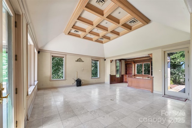 empty room featuring light tile patterned flooring, coffered ceiling, beamed ceiling, and a towering ceiling