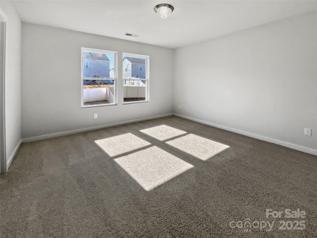 view of carpeted spare room