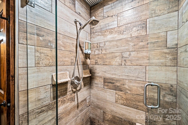 full bath featuring a stall shower