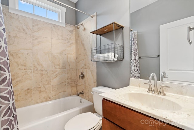 full bathroom featuring toilet, vanity, and shower / tub combo