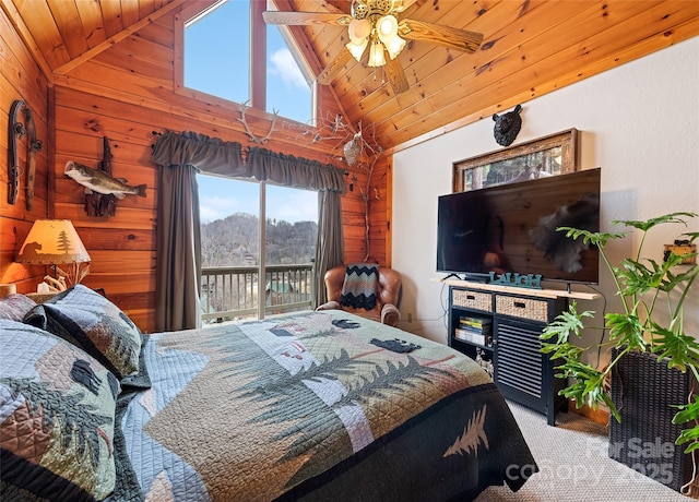 bedroom with access to outside, wood walls, wooden ceiling, and carpet floors