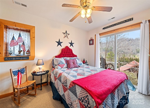 bedroom featuring access to exterior, visible vents, and carpet floors