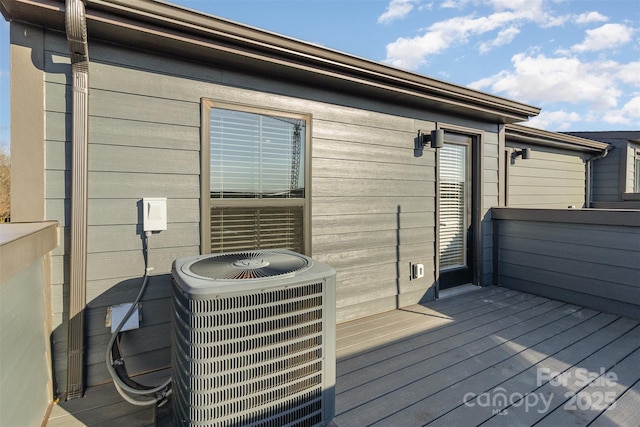 deck with central air condition unit