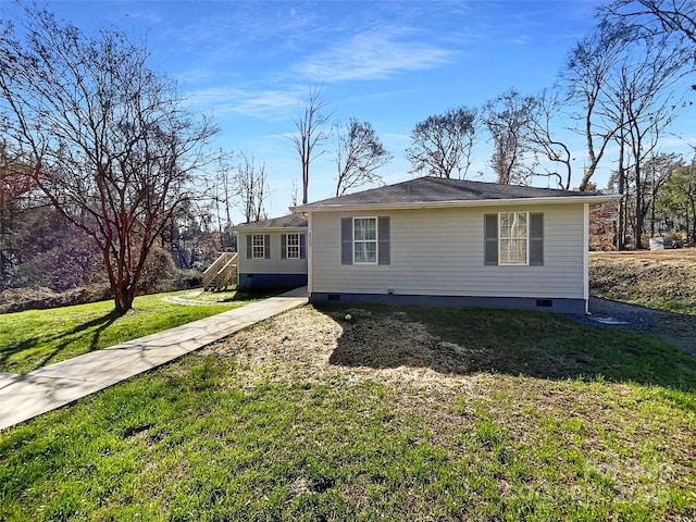 ranch-style home featuring a front yard and crawl space