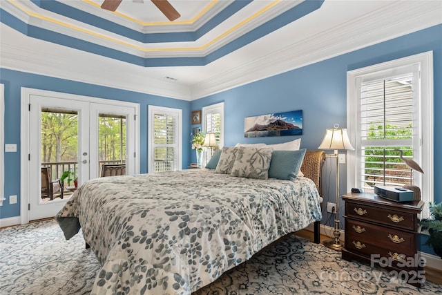 bedroom featuring access to outside, french doors, multiple windows, and crown molding