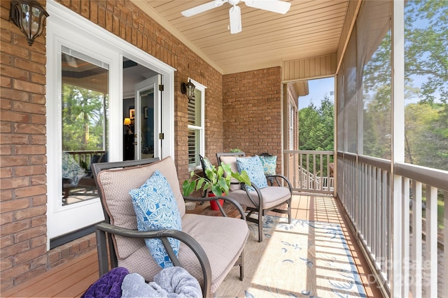 exterior space featuring a ceiling fan