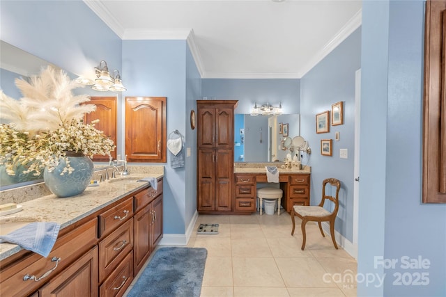 full bath featuring ornamental molding, a sink, baseboards, and tile patterned floors