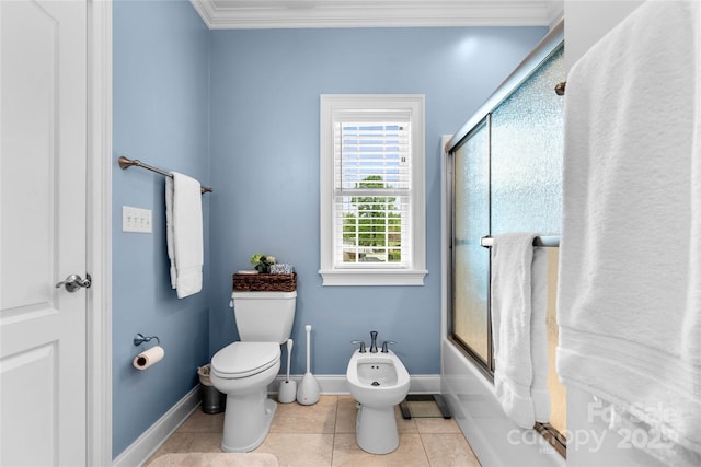 full bathroom featuring toilet, shower / bath combination with glass door, ornamental molding, tile patterned floors, and a bidet