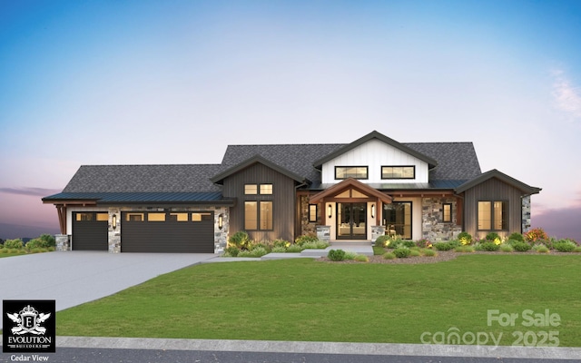 modern farmhouse style home with stone siding, metal roof, a standing seam roof, a yard, and board and batten siding