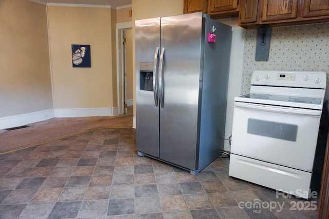 kitchen with decorative backsplash, stainless steel fridge with ice dispenser, and electric range