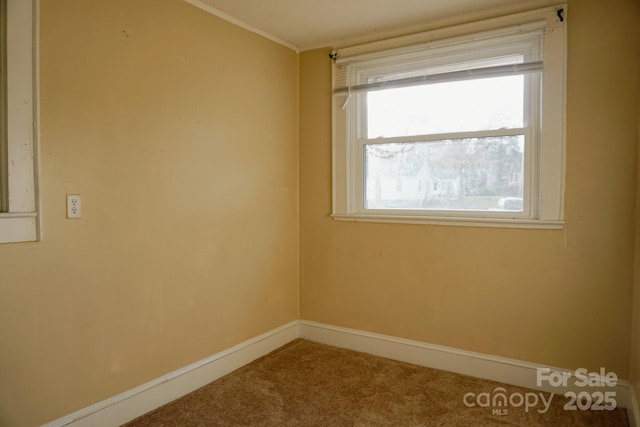 view of carpeted spare room