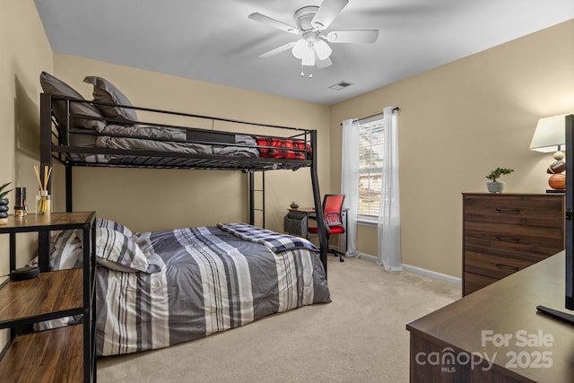 bedroom with carpet floors, baseboards, visible vents, and ceiling fan