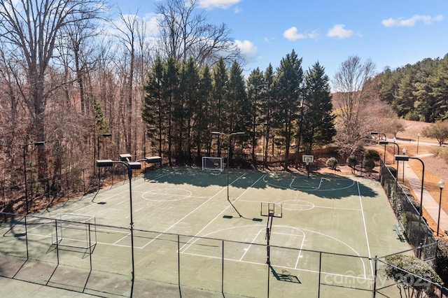 view of sport court with community basketball court and fence