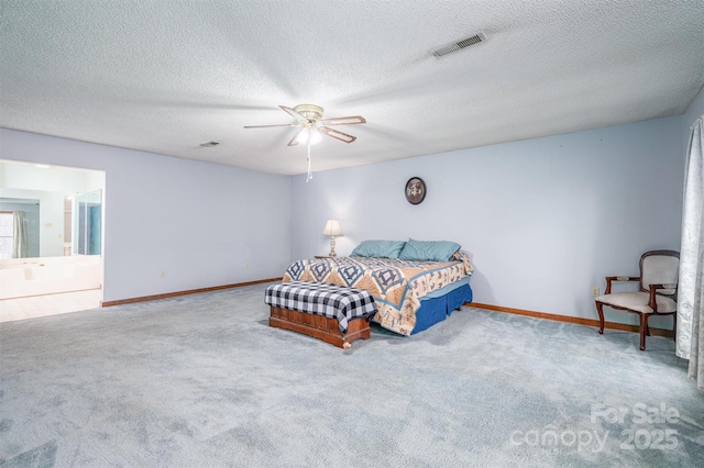 carpeted bedroom with visible vents, ceiling fan, and baseboards