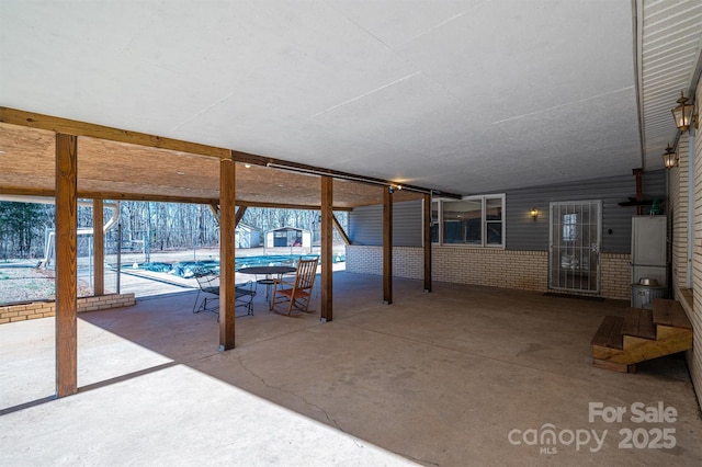 view of patio / terrace with a swimming pool