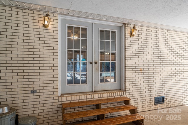 doorway to property with french doors