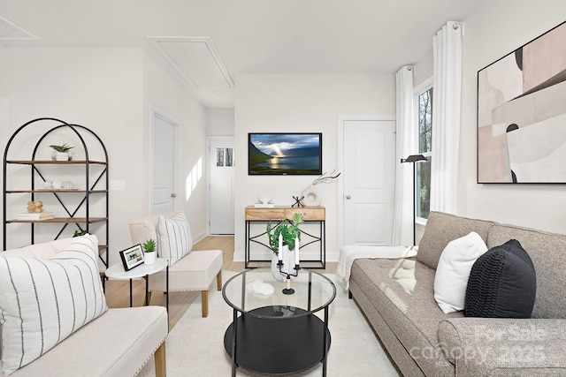 living room with light hardwood / wood-style flooring