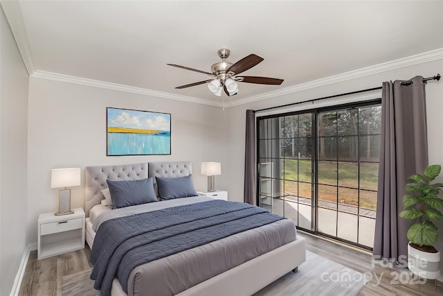 bedroom featuring ornamental molding, light wood-type flooring, multiple windows, and baseboards