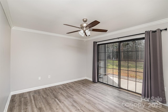 spare room with light wood-style floors, crown molding, baseboards, and ceiling fan