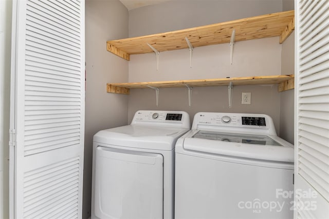 washroom with laundry area and separate washer and dryer