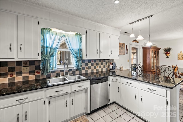 kitchen featuring kitchen peninsula, hanging light fixtures, dishwasher, white cabinetry, and sink
