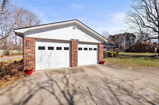 garage with a yard