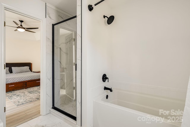 ensuite bathroom featuring a marble finish shower, a ceiling fan, ensuite bathroom, marble finish floor, and a bath