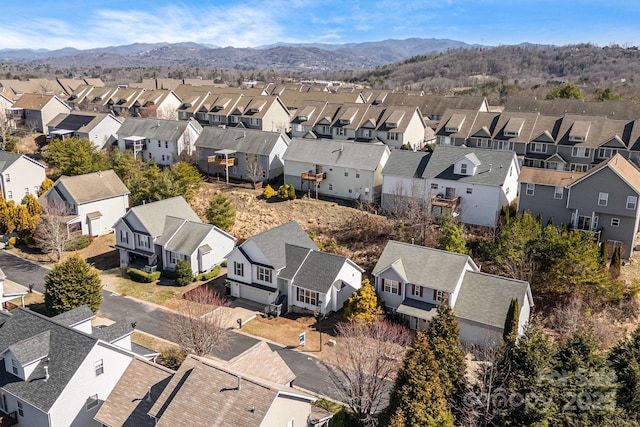 drone / aerial view with a mountain view and a residential view