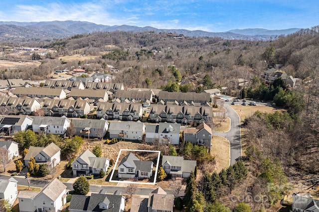 birds eye view of property featuring a residential view and a mountain view