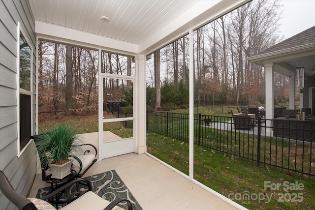 sunroom / solarium with wooden ceiling