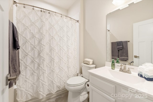 full bath featuring vanity, toilet, and shower / bath combo with shower curtain