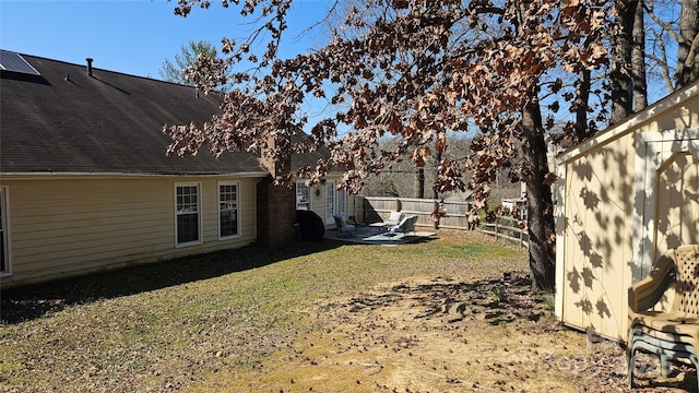 view of yard with a patio and a fenced backyard