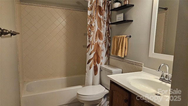 full bathroom featuring shower / tub combo, tile walls, vanity, and toilet