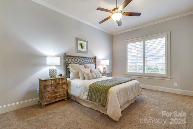 carpeted bedroom with ceiling fan and ornamental molding