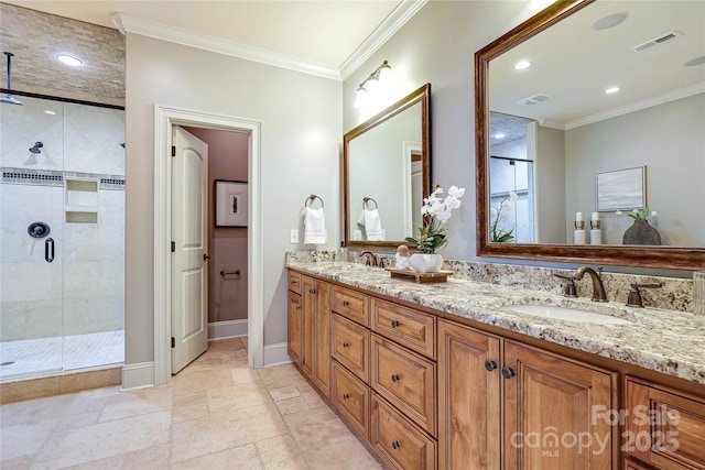 bathroom featuring vanity, crown molding, and a shower with shower door