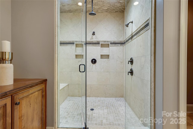 bathroom with vanity and walk in shower