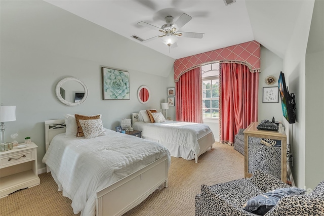 bedroom featuring lofted ceiling, light carpet, visible vents, and a ceiling fan