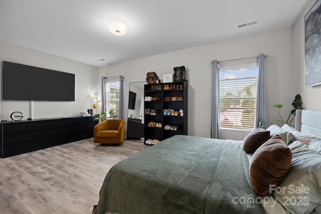 bedroom featuring light hardwood / wood-style flooring