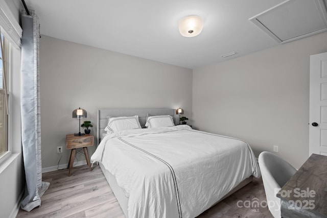 bedroom featuring light hardwood / wood-style floors