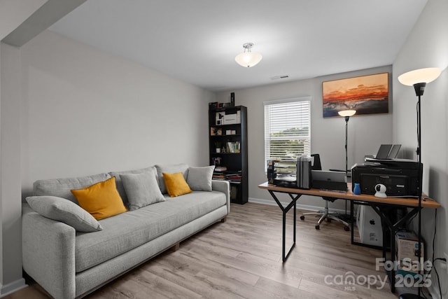 home office featuring light hardwood / wood-style flooring