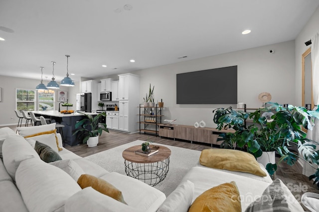 201 Bennett Trail Dr, Mount Holly, NC 28120 - living room with wood finished floors and recessed lighting