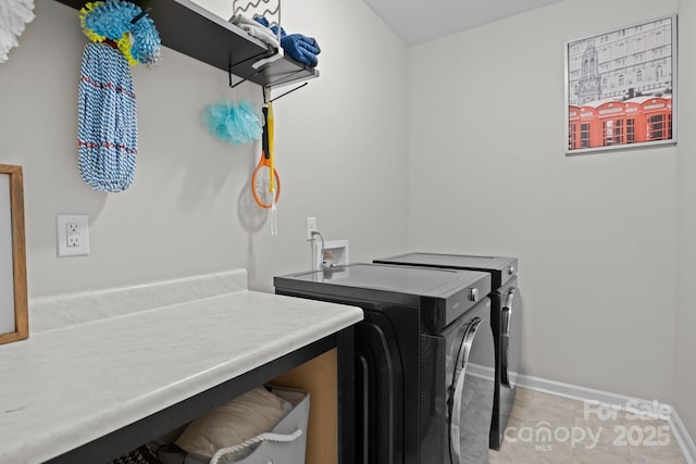 201 Bennett Trail Dr, Mount Holly, NC 28120 - laundry area featuring washer and dryer and baseboards