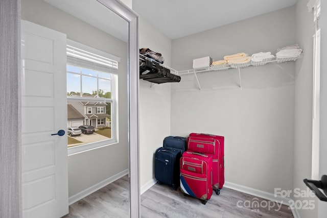 201 Bennett Trail Dr, Mount Holly, NC 28120 - spacious closet featuring wood finished floors