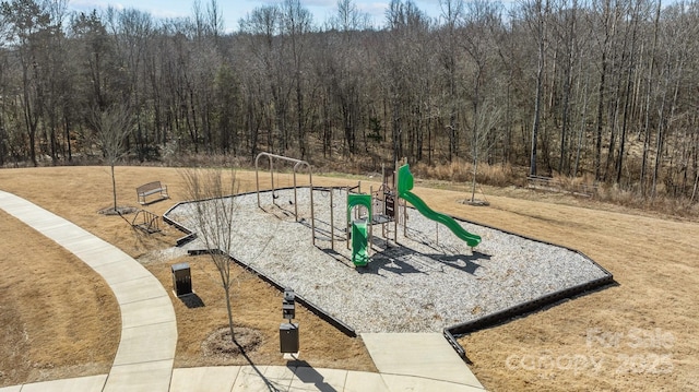 201 Bennett Trail Dr, Mount Holly, NC 28120 - community jungle gym featuring a view of trees