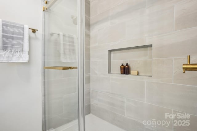 bathroom with a stall shower