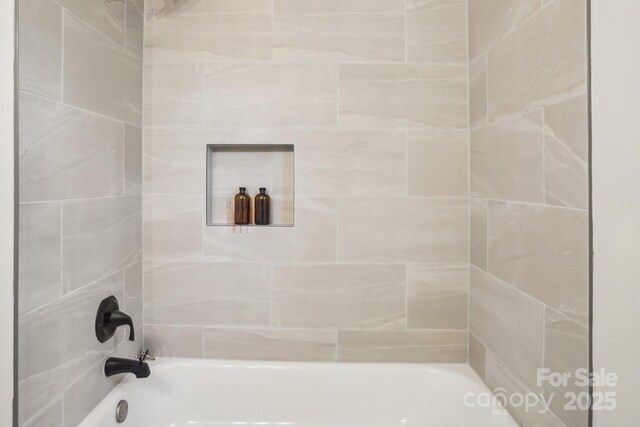bathroom featuring shower / bathtub combination