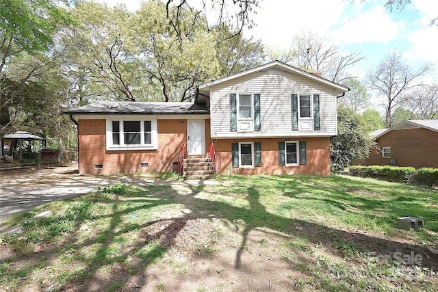 6126 Eagle Peak Dr, Charlotte, NC 28214 - split level home featuring crawl space, a front lawn, entry steps, and brick siding