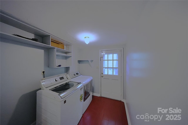 6126 Eagle Peak Dr, Charlotte, NC 28214 - washroom with dark wood-type flooring, baseboards, washer and dryer, and laundry area