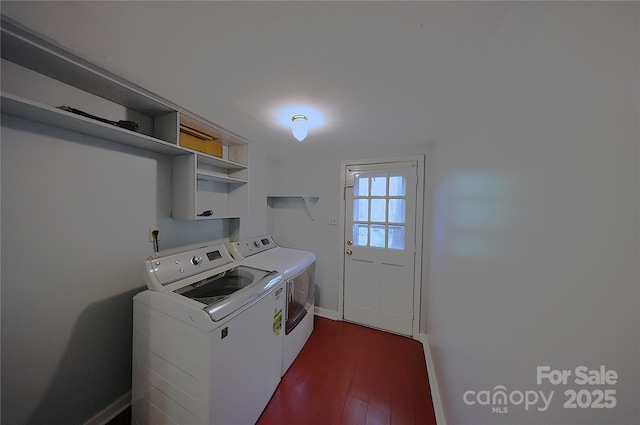 6126 Eagle Peak Dr, Charlotte, NC 28214 - laundry area featuring dark wood finished floors, separate washer and dryer, baseboards, and laundry area